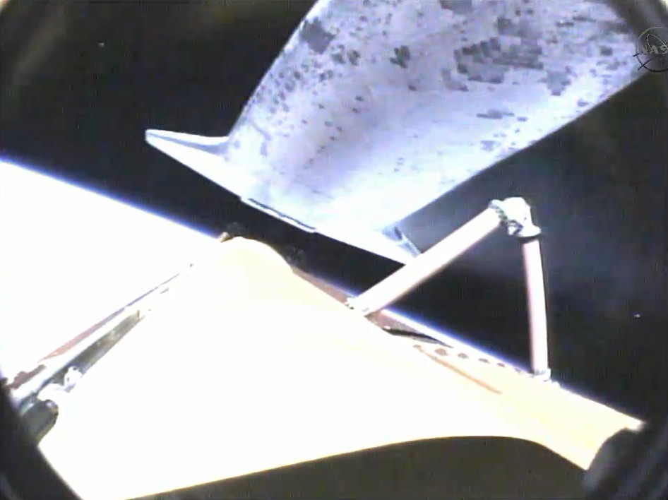 Astronauts Inspect Shuttle Heat Shield for Dings
